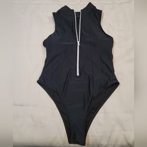 Black one piece with white zipper